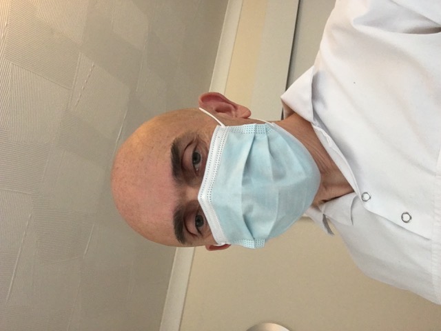 Chris the osteopath wearing a mask
